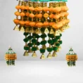 Handmade-orange-green-pom-pom-beaded-jhumar.webp