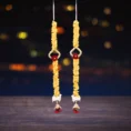 decorative-marigold-latkan-with-red-rose-door-hanging-for-diwali-weddings.webp