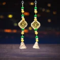 ethnic-decorative-diwali-latkan-with-golden-tassels-and-beads.webp