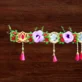 floral-toran-with-purple-roses.webp