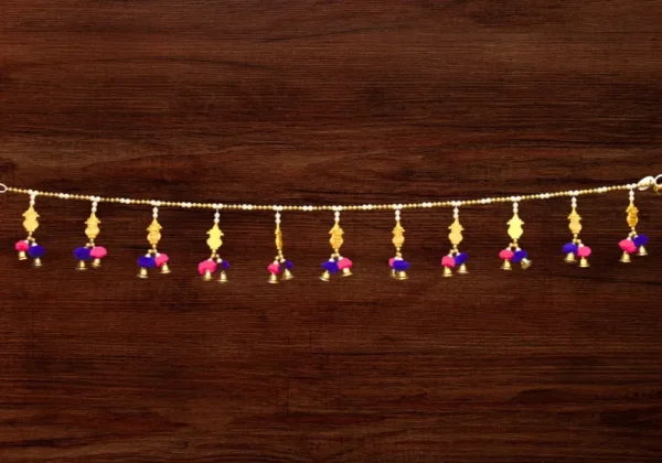 golden-door-toran-with-pom-poms-bells.webp