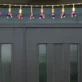 golden-door-toran-with-pom-poms-bells-for-festive-home-decor.webp