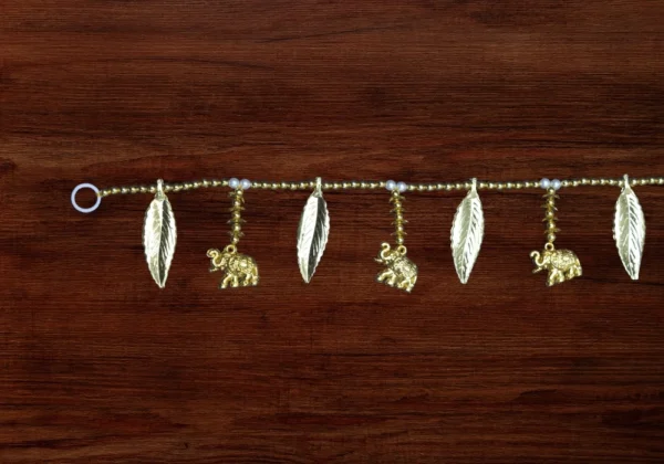 golden-elephant-leaf-wall-hanging-toran.webp