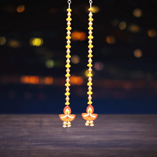 orange-diya-latkan-for-diwali-wall-hanging-decorative-diwali-latkans-for-diwali.webp