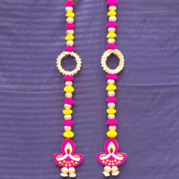 pink-diya-latkan-for-diwali.webp