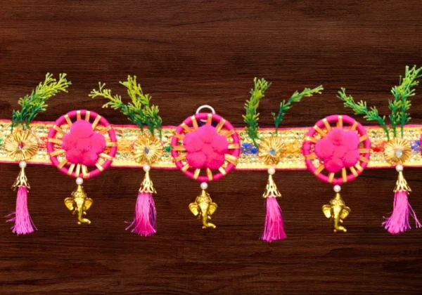 pink-floral-door-toran-with-golden-bells.webp