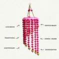 pink-pom-pom-and-beaded-handmade-jhumar-with-golden.webp