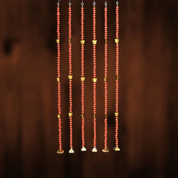 pompom-door-hanging-with-golden-butterfly.webp