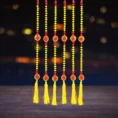 red-and-yellow-pompom-diwali-latkan-for-home-door-decoration-wall-hanging.webp