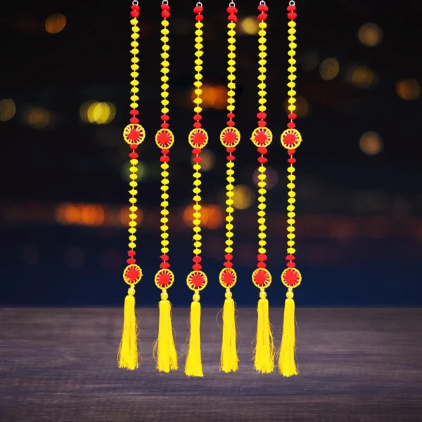 red-and-yellow-pompom-diwali-latkan-for-home-door-decoration-wall-hanging.webp