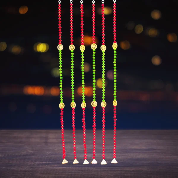 red-green-pompom-diwali-latkan-with-swastik-golden-ganti-door-hanging.webp
