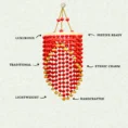 red-pompom-diwali-jhumar-with-yellow-flower.webp