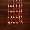 red-pompom-latkan-with-golden-ghanti-tassels-for-door-decoration.webp