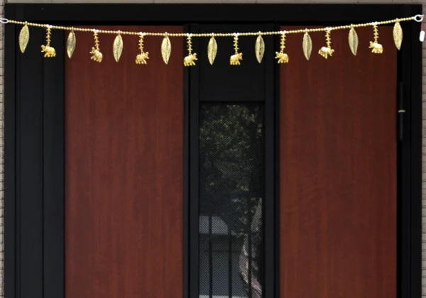 traditional-golden-elephant-leaf-wall-hanging-toran-for-home-decoration.webp