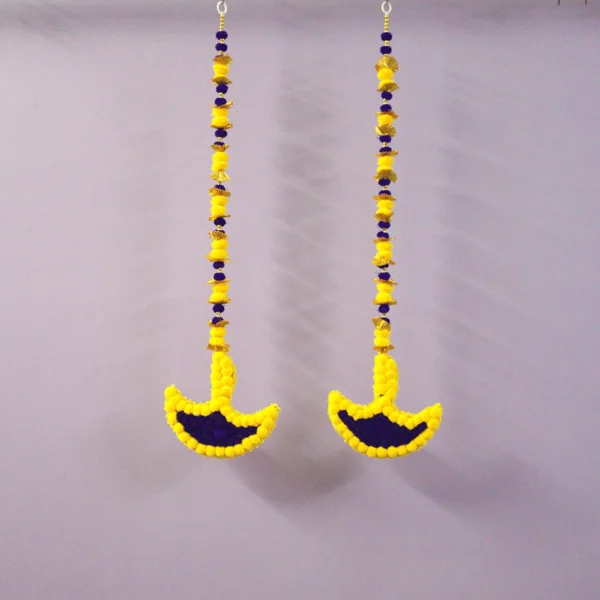 yellow-blue-pom-pom-diya-shape-latkan.webp