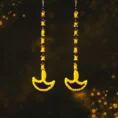 yellow-blue-pom-pom-diya-shape-latkan-for-diwali-decoration.webp